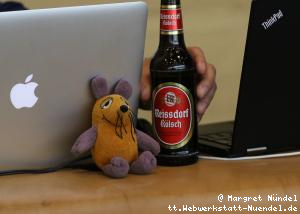 Maus zwischen MacBook und ThinkPad